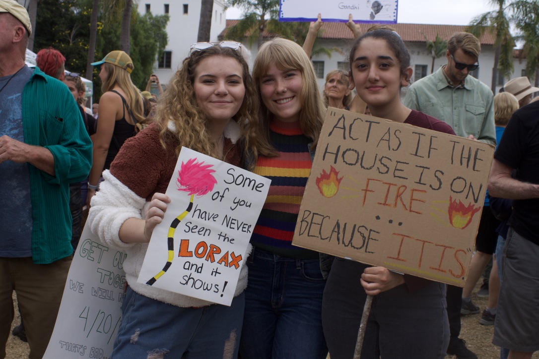 young protestors holding signs