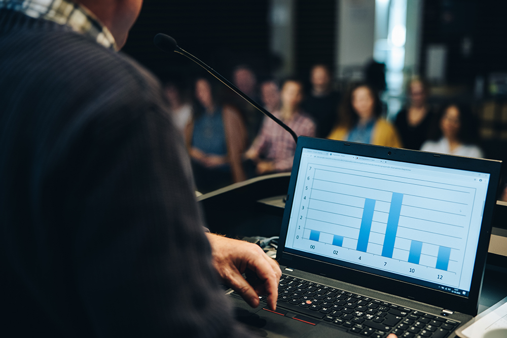 stock photo of a data chart being prsented to an audience