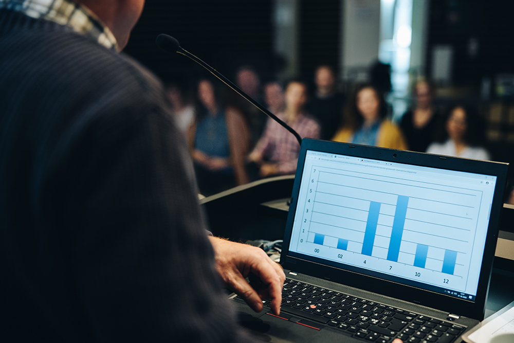 stock photo of a data chart being prsented to an audience