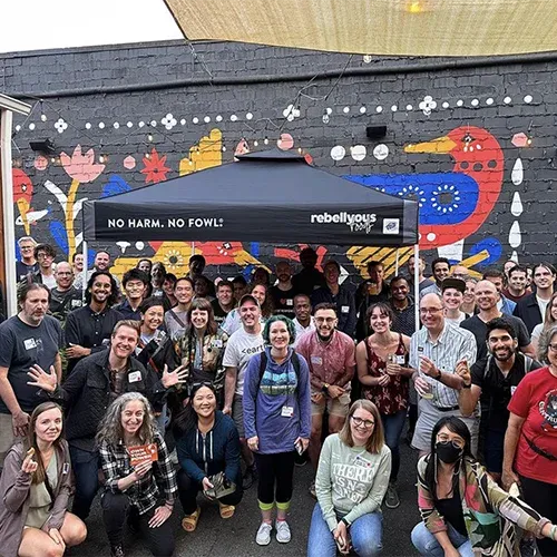 changemakers gather under a tent