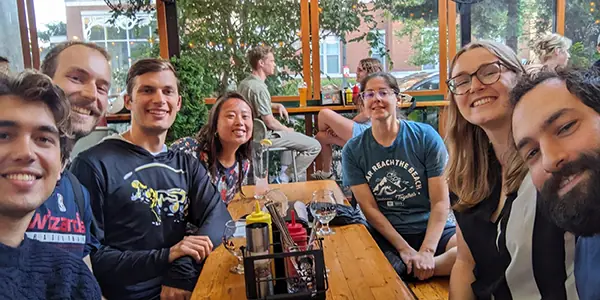 people at a table for an hour of action
