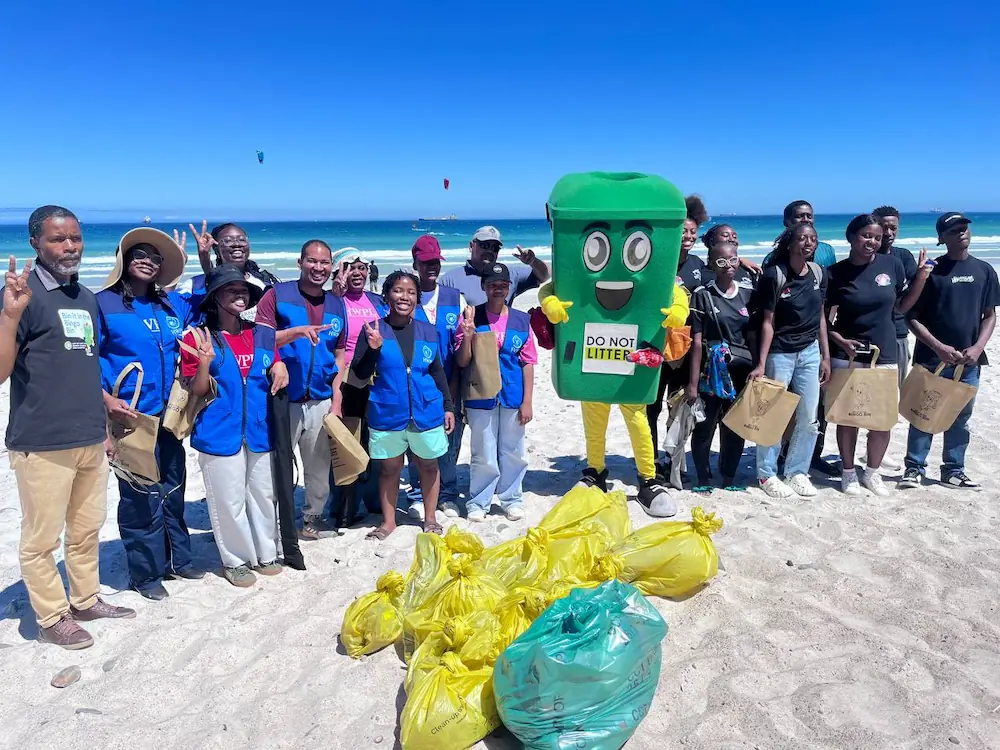 group photo with recycling mascot