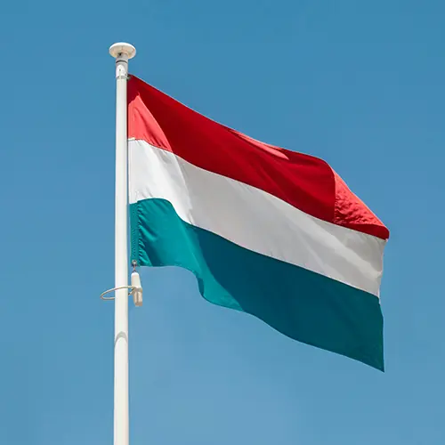 hungarian flag waving against the sky