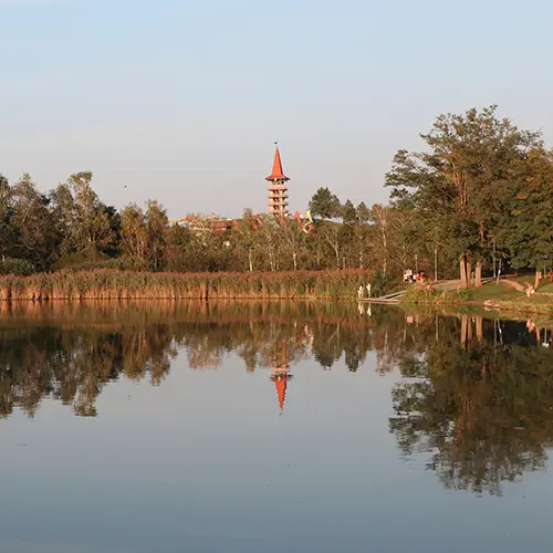 Hungarian lake reflecting a tower