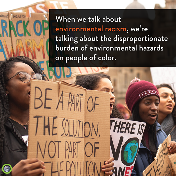 A group of people holding signs