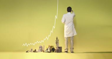 Scientist drawing a line graph