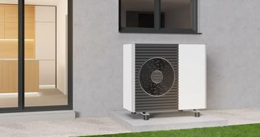 Heat Pump along the outside wall of a house