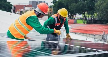 Workers Installing solar panel