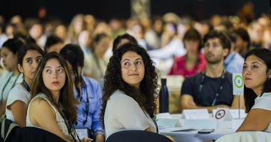 climate leaders listening to speakers