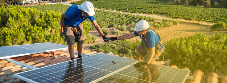 workers installing solar panels