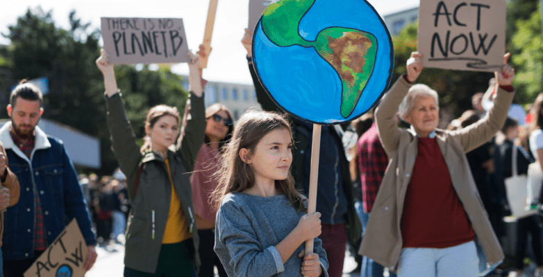 Child holding sign at protest