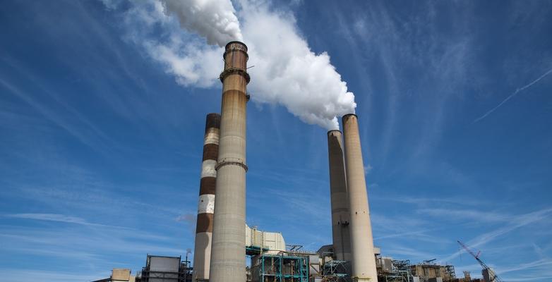 smoke stacks polluting the sky