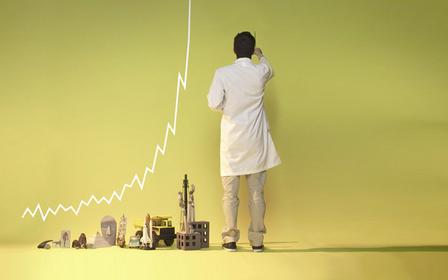 Scientist drawing a line graph