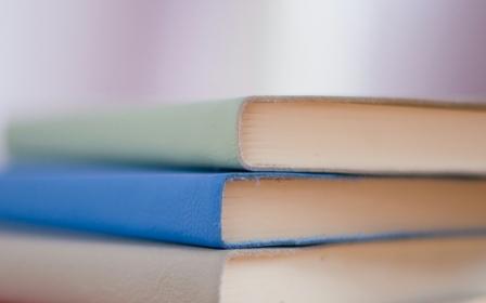 stack of books of different colors
